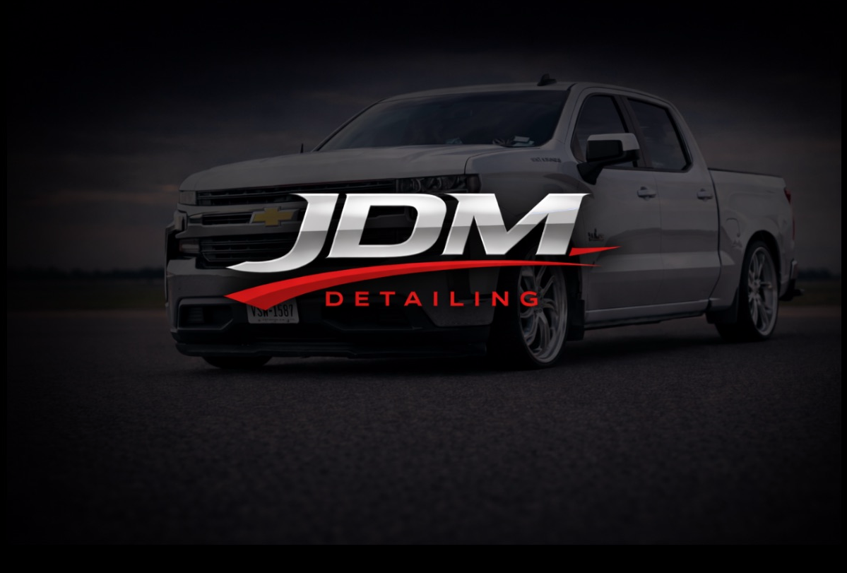 JDM Detailing logo over white Silverado